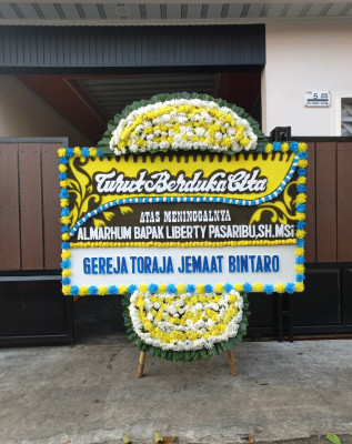 Papan Bunga Duka di Sidomoyo